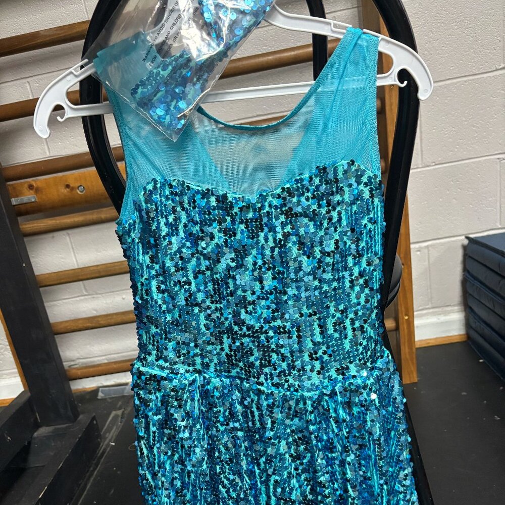 Blue sequin dance costume with bow